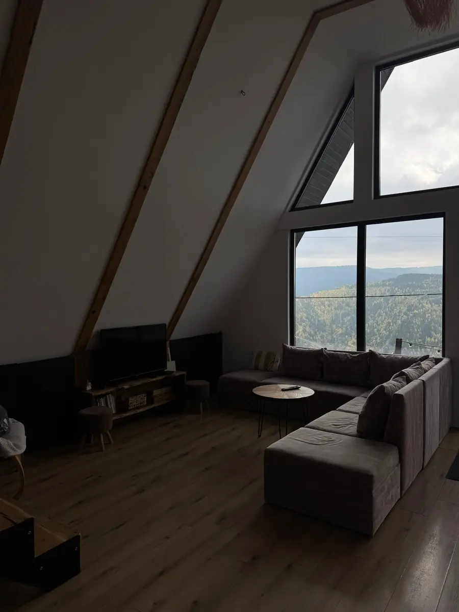 Living room with TV corner and sofa